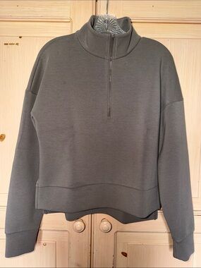 Relaxed Half-Zip Funnel Neck Sweater.